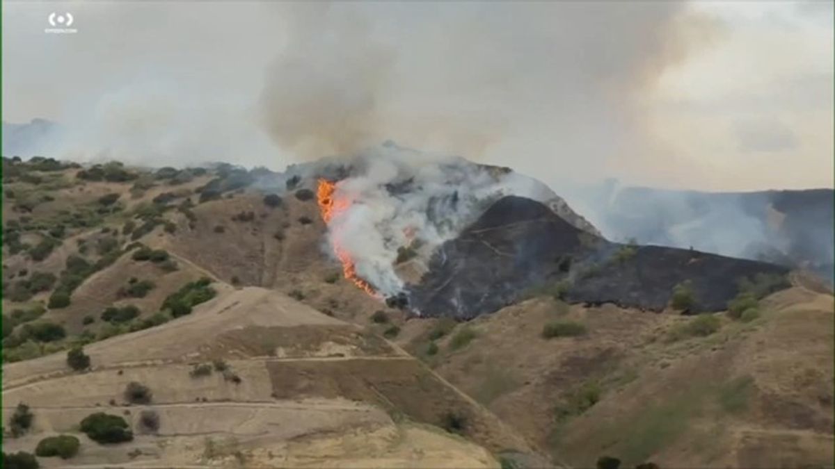 Evacuation warnings issued for brush fire burning in Orange County ...