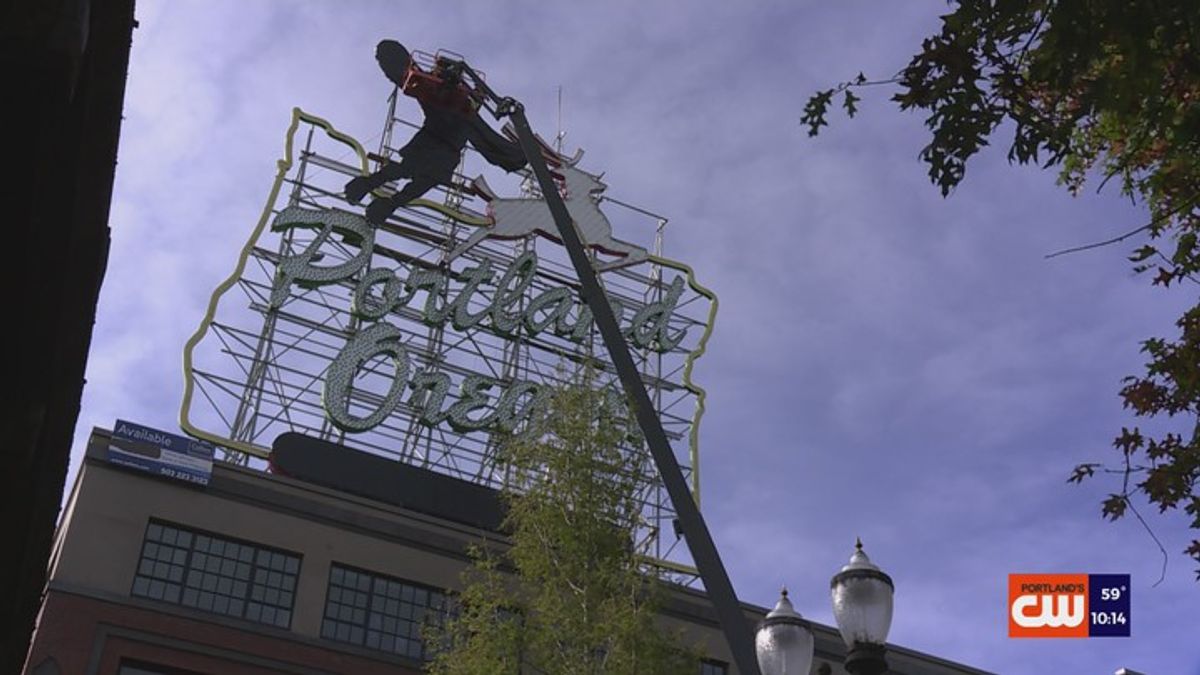 Portland's iconic White Stag sign sports new mystery figure | Haystack News