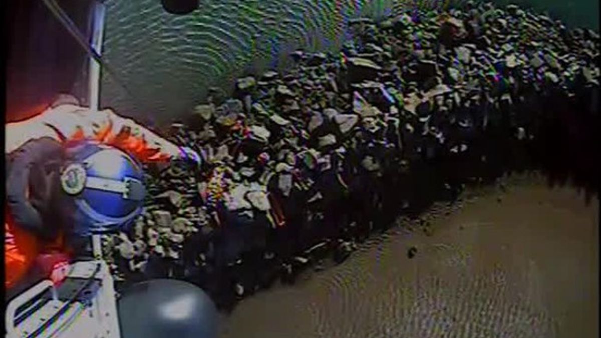 Coast Guard helicopter rescues man pinned by a rock at a jetty in Astoria