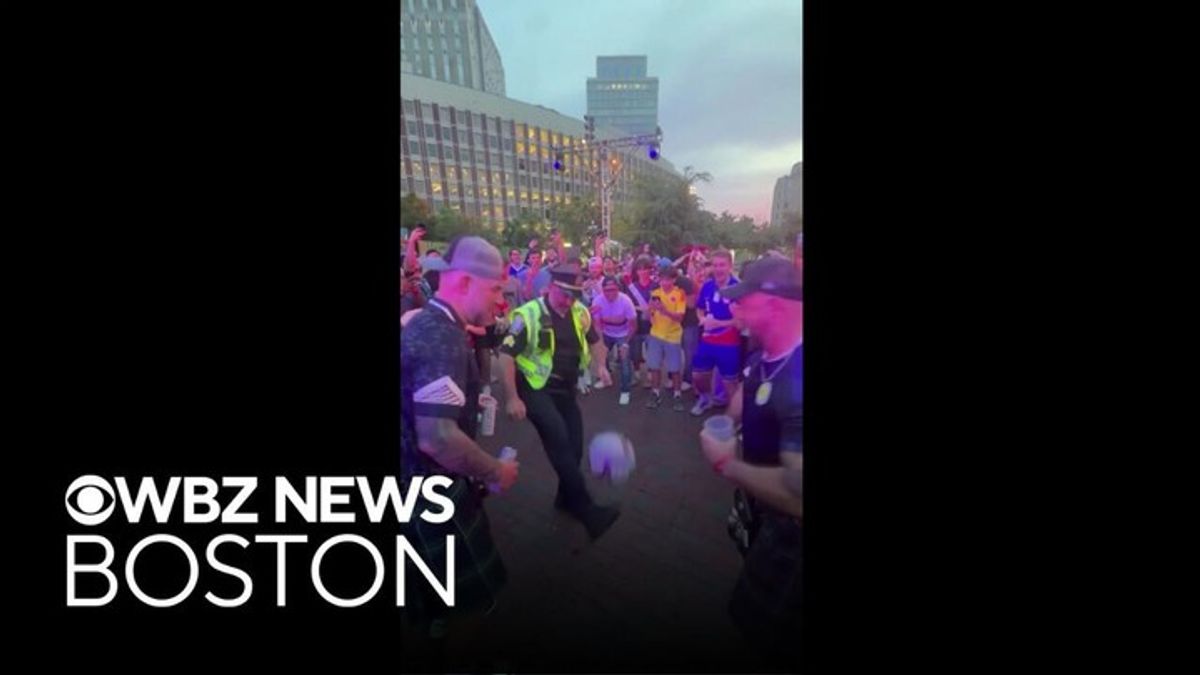 Boston Police officer goes viral for juggling soccer ball with Scotland ...