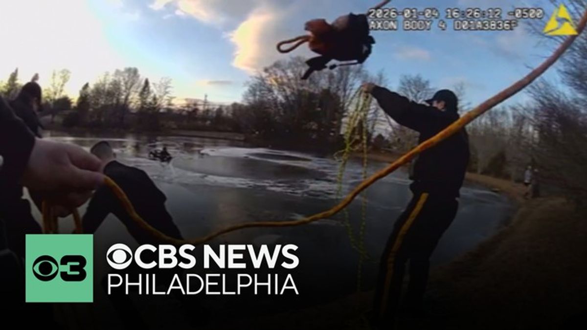 Police bodycam video shows New Jersey officers rescuing person trapped ...