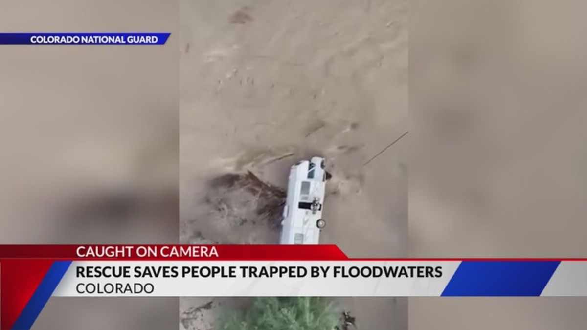 Helicopter rescue saves 2 people, 5 pets trapped in RV by floodwaters ...