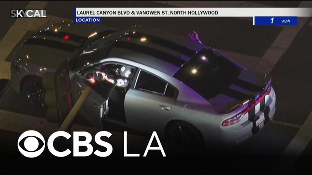 Possibly armed suspect surrenders after leading LAPD officers on ...