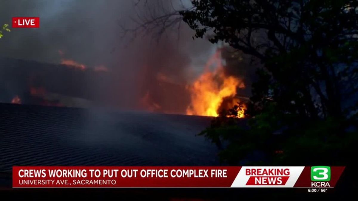 Sacramento fire crews work to contain suspicious fire at office ...