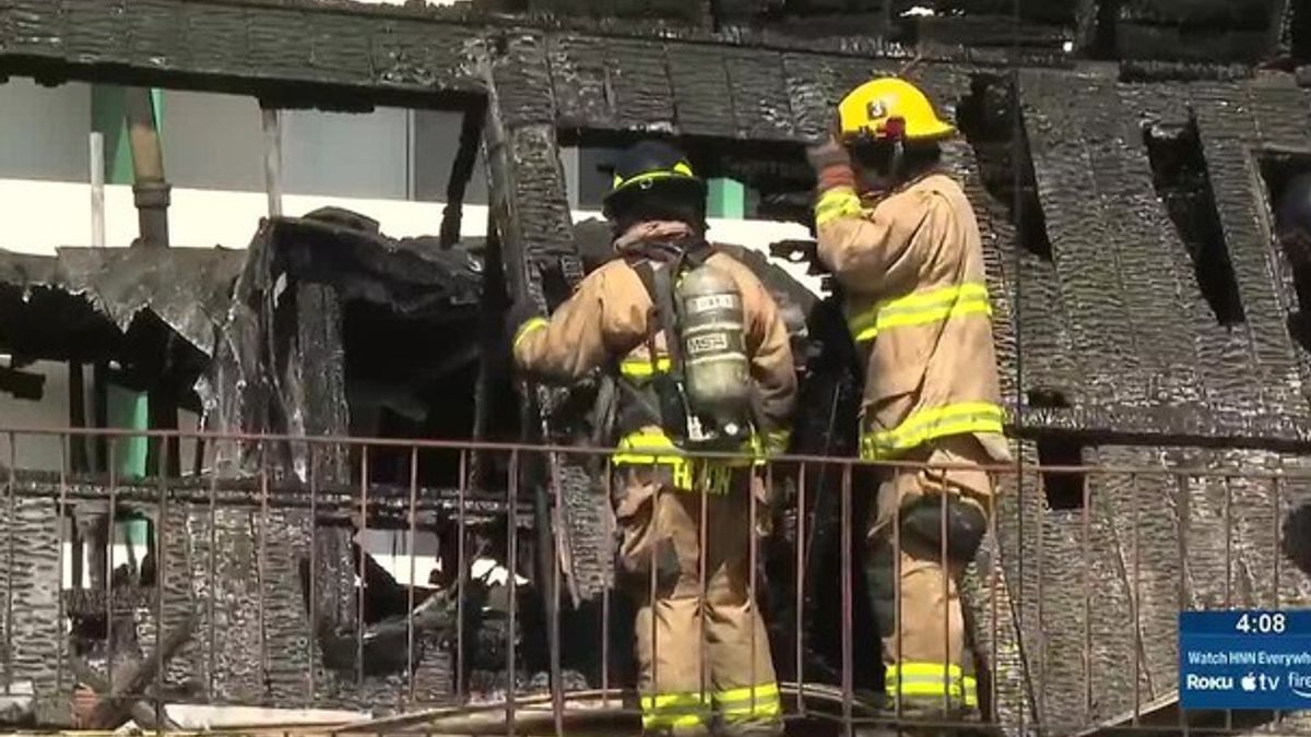 Investigators work to determine origin of building fire in McCully ...