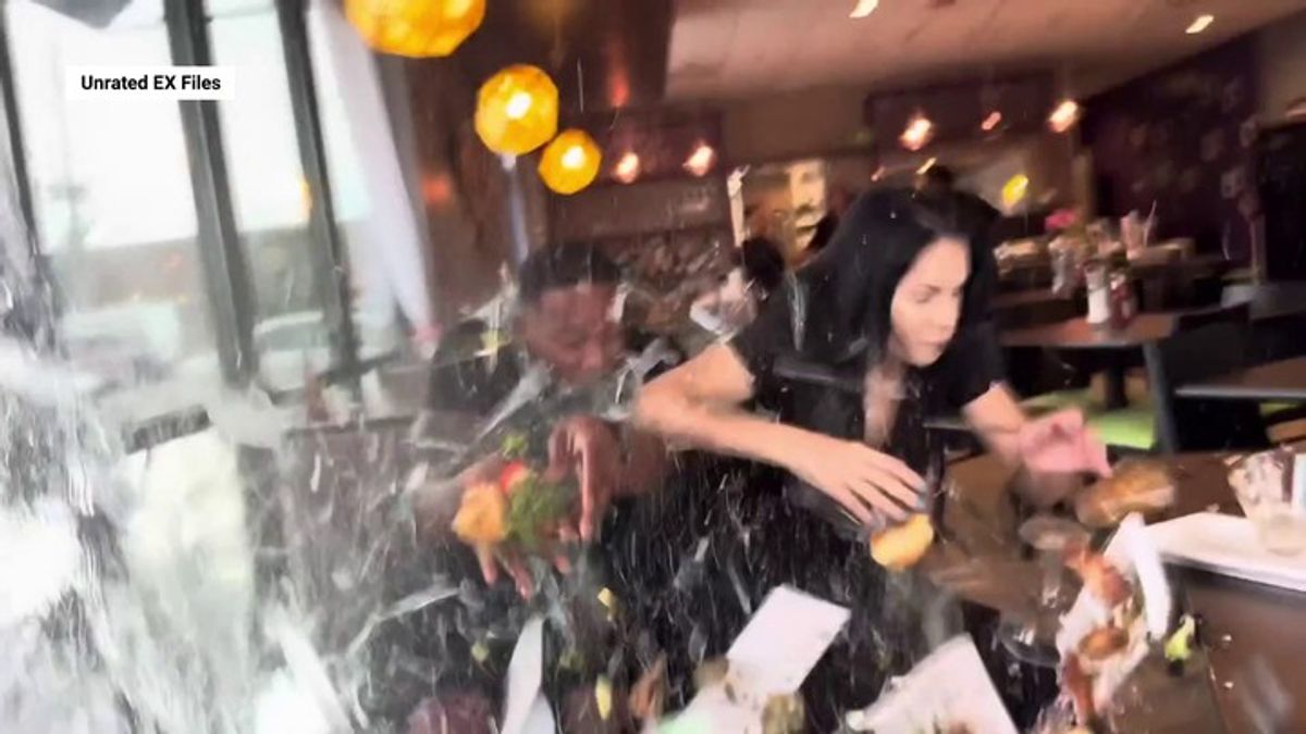 Food influencers injured after car slams into restaurant as they filmed ...