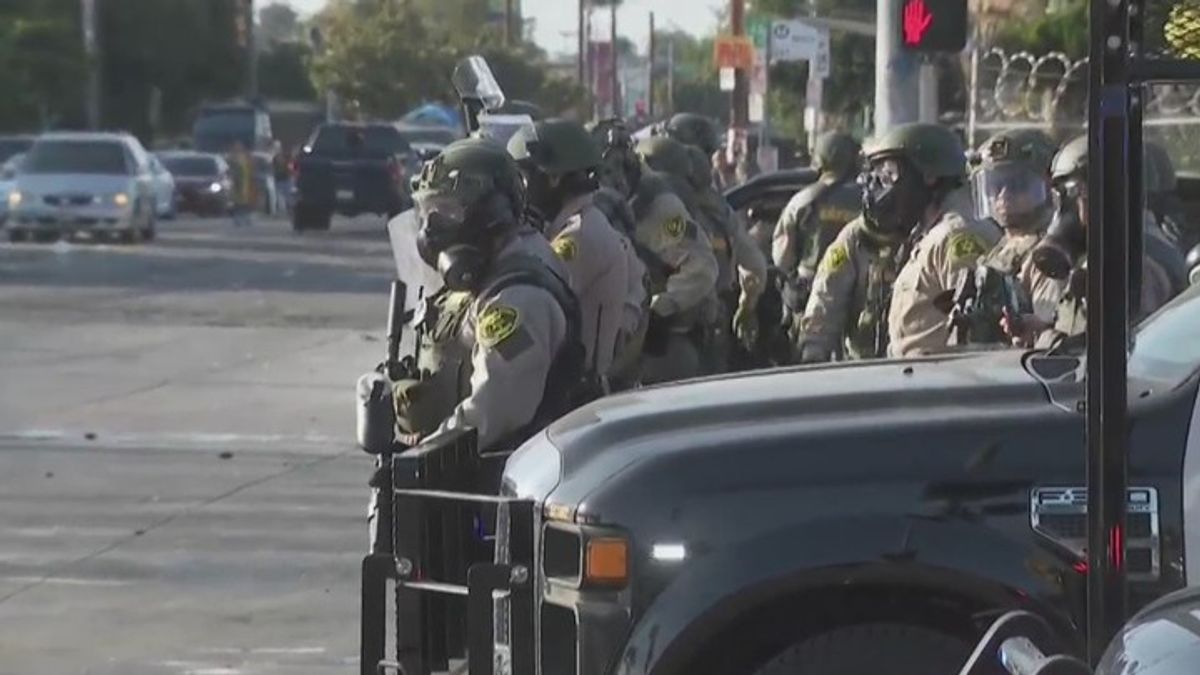 Trump signs memorandum to deploy National Guard in Los Angeles ...