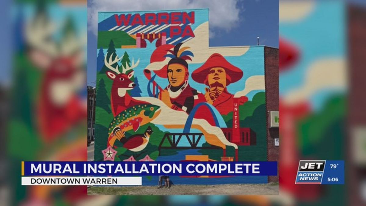 A colorful mural featuring Native American figures and local symbols in Warren, PA