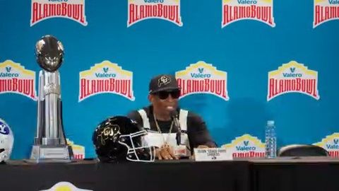 Deion Sanders gets ready to coach his sons on the football field for