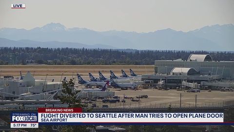 Houston-bound plane diverts to Seattle after passenger tries opening